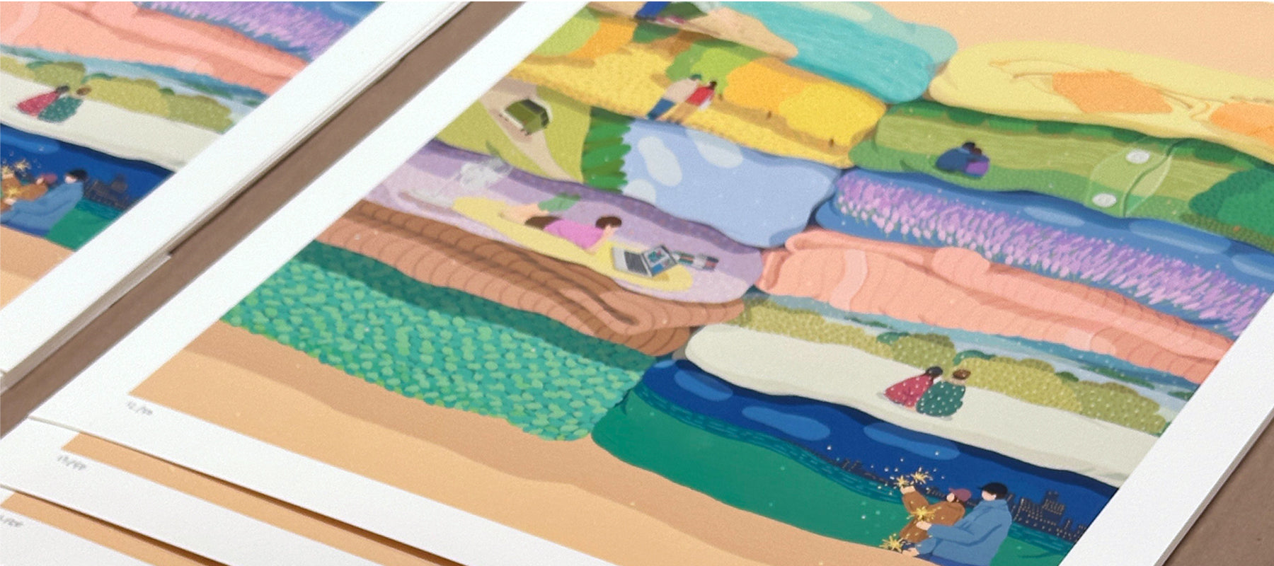 Set of colorful landscape paintings with people in a field within laundry stacks.