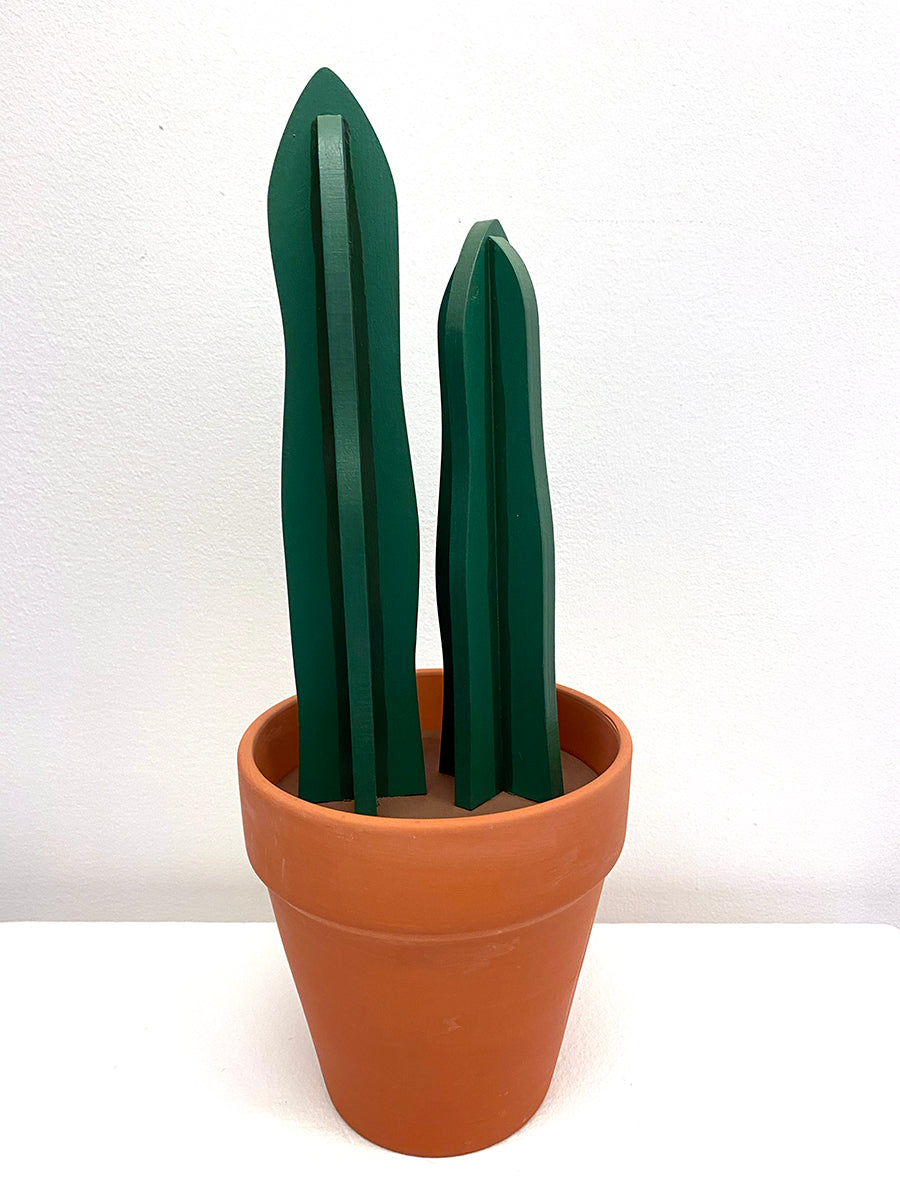 Wooden sculpture of a cactus in a terracotta pot 